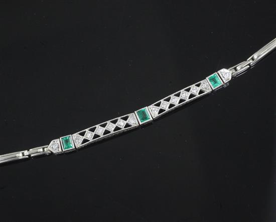 A 1920s 18ct white gold and platinum, emerald and diamond bracelet, in a fitted Asprey, London box.